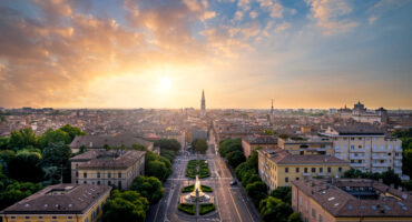The,City,Of,Modena,Seen,During,A,Summer,Sunset,From