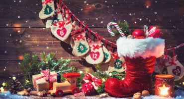 Christmas,Background.,Advent,Calendar,And,Santa's,Shoe,With,Gifts,On