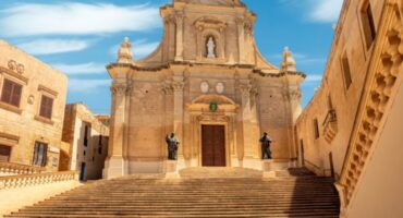The,Imposing,Facade,Of,Roman,Catholic,Assumption,Cathedral,Looms,Over
